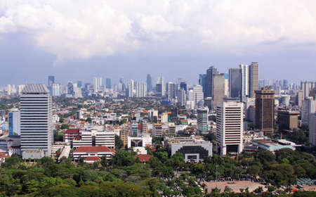 JAKARTA, INDONESIA - May 30, 2013: Jakarta cityscape with white clouds, in daylight, Jawa, Indonesiaのeditorial素材
