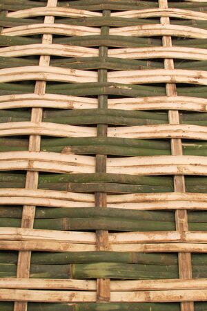 Bamboo weave texture background design natural handicraft vertical. Nature background of green and...
