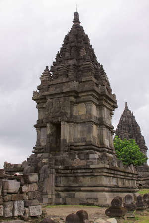 Tower detail at famous Prambanan hindu temple, Yogyakarta, Java, Indonesia. Candi Prambanan - Stone structures and rubble at iconic travel destinationのeditorial素材