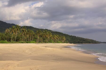 Empty beach at Pantai Setagi, near Senggigi, Lombok, Indonesia. Exotic tropical destination beach on islandの写真素材