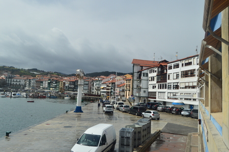 Beautiful Shot Of The Wooden Buildings Of The Port District On The Bay Taken From The Lonja De Lekeitio. March 24, 2018. Architecture Nature Landscapes. Lekeitio Vizcaya Basque Country Spain.のeditorial素材