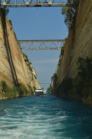 Boat Sailing On The Corinth Canal. Architecture, Travel, Landscape. July 8, 2018. Corinth Canal Peloponnesus Greece.の写真素材