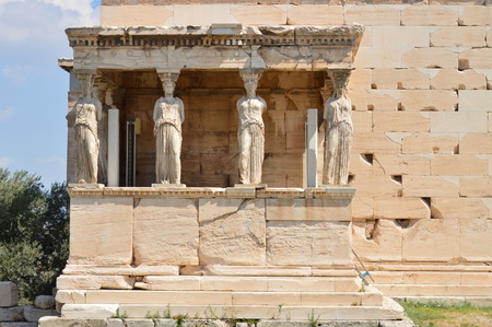 Set Of Beautiful Sphinxes On The Facade Of The Erechtheion Known As The Caryatids In The Acroplis Of Athens. History, Architecture, Travel, Cruises. July 9, 2018. Acropolis Of Athens, Greece.の写真素材