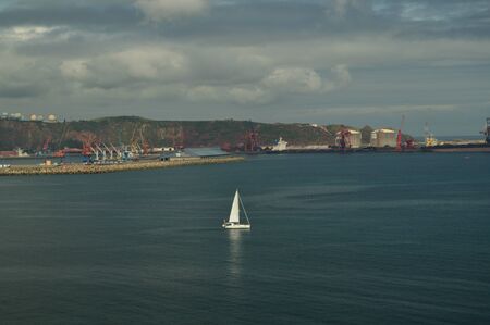 Pretty Boats Sailing In The Bay Seen From The Park Of Cimadevilla In Gijon. Nature, Travel, Holidays, Cities. July 31, 2018. Gijon, Asturias, Spain.のeditorial素材