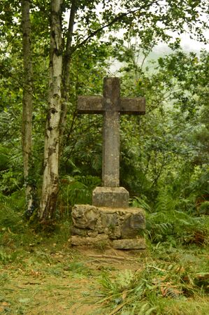 Asturias Cross On The Camin Encantau Route In The Council Of Llanes. Nature, Travel, Landscapes, Forests, Fantasy. July 31, 2018. Valle De Ardinasa, Venta Village, Asturias, Spain.のeditorial素材