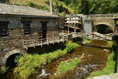 Water Mill Moved By The Force Of A Beautiful Waterfall In Taramundi, Asturias, Spain. Architecture, History, Travel. August 2, 2018のeditorial素材