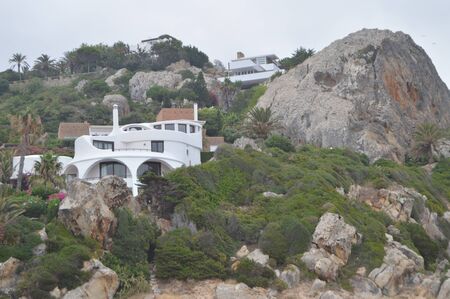 Picturesque Houses On The Cliff Of Atlanterra Beach In Zahara. Nature, Architecture, History, Street Photography. July 12, 2014. Zahara De Los Atunes, Cadiz, Spainのeditorial素材