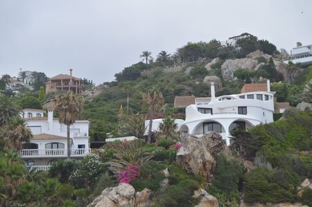 Picturesque Houses On The Cliff Of Atlanterra Beach In Zahara. Nature, Architecture, History, Street Photography. July 12, 2014. Zahara De Los Atunes, Cadiz, Spainのeditorial素材