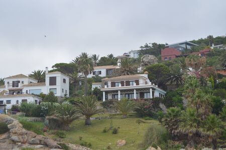 Picturesque Houses On The Cliff Of Atlanterra Beach In Zahara. Nature, Architecture, History, Street Photography. July 12, 2014. Zahara De Los Atunes, Cadiz, Spainのeditorial素材