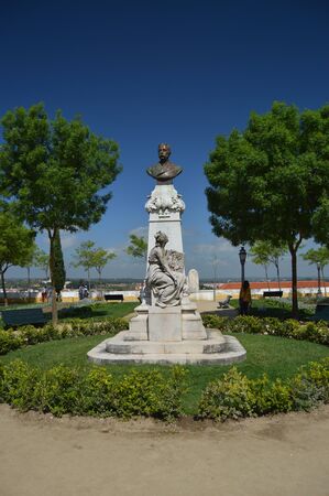 Sculpture Of Doctor Barahona In The Garden Of Diana In The City In Evora. Nature, Architecture, History, Street Photography. April 11, 2014. Evora, Portugal.のeditorial素材