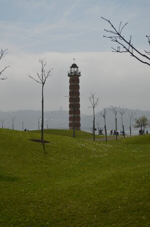 Wonderful Lighthouse In A Beautiful Green Park Full Of Grass In Belem In Lisbon. Nature, architecture, history, street photography. April 11, 2014. Lisbon, Portugal.のeditorial素材
