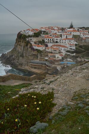 Views Of The Houses Perfectly Located On A Cliff And With A Natural Pool On Their Background In Colares. Nature, architecture, history. April 14, 2014. Colares, Sintra, Lisbon, Portugal.のeditorial素材