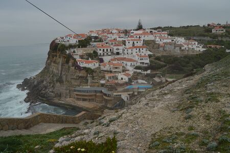 Views Of The Houses Perfectly Located On A Cliff And With A Natural Pool On Their Background In Colares. Nature, architecture, history. April 14, 2014. Colares, Sintra, Lisbon, Portugal.のeditorial素材