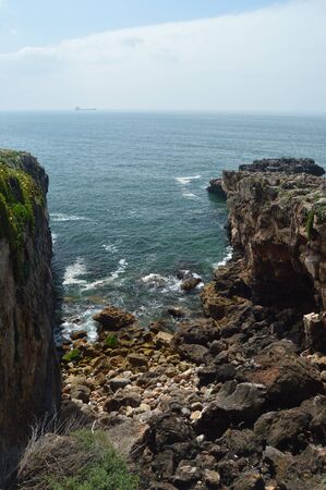 Wonderful Viewpoint And Geological Formation Of The Grotto Of The Mouth Of Hell In Cascais. Photograph of Street, Nature, architecture, history, Geology. April 15, 2014. Cascais, Lisbon, Portugal.のeditorial素材