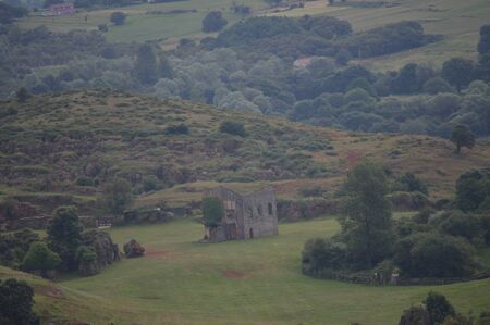 Privileged Views Of A Broken Church In The Meadow In The Natural Park Of Cabarceno Old Mine Of Iron Extraction. August 25, 2013. Cabarceno, Cantabria. Holidays Nature Street Photography Animals Wildlife.の写真素材