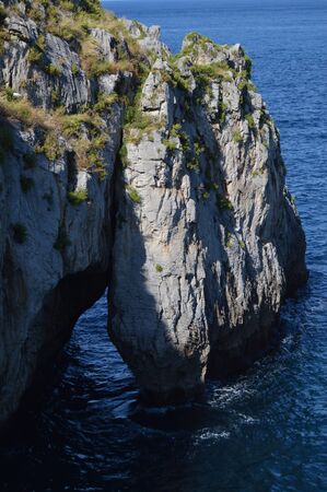 Wonderful Arch Formed On The Rock On The Coastline On The Promenade In Castrourdiales. August 27, 2013. Castrourdiales, Cantabria, Spain. Vacation Nature Street Photography.のeditorial素材