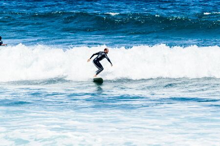 Short Hair Brunette Man With Beard Breaking Waves On Las Americas Beach. April 11, 2019. Santa Cruz...