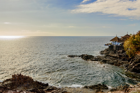 Terrace Of A Payoza On A Cliff With A Privileged View Of The Infinite Ocean At Sunset Beach Las Americas. April 11, 2019. Santa Cruz De Tenerife Spain Africa. Travel Tourism Street Photography.のeditorial素材