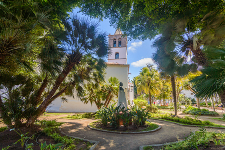 Side Of Beautiful church of San Marcos in the village of Icod de los Vinos. April 14, 2019. Icod De Los Vinos, Santa Cruz De Tenerife Spain Africa. Travel Tourism Street Photography.のeditorial素材
