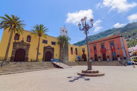 Colorful And Cheerful Traditional Buildings On The Square In Garachico. April 14, 2019. Garachico, Santa Cruz De Tenerife Spain Africa. Travel Tourism Street Photography.のeditorial素材