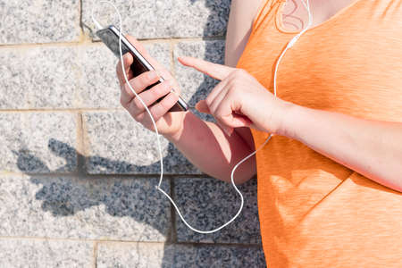 feet of an unrecognizable runner with running shoes on a wooden floor, concept of sport and healthy lifestyle, copy space for textの写真素材