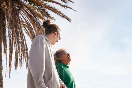 couple laughing and having a fun strollingの写真素材
