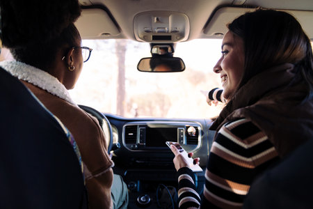 Interracial friends on road trip in camper vanの写真素材