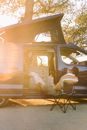 women chatting and having fun in a camper van