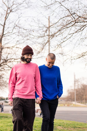 couple smiling happy walking in the the cityの写真素材