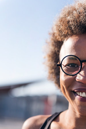 cropped portrait of an african smiling womanの写真素材