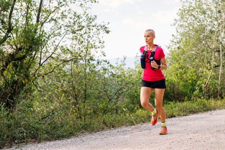 woman running in the countrysideの写真素材