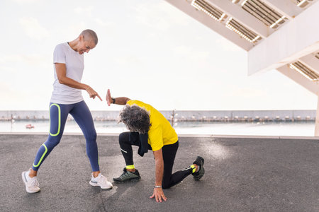 trainer asking for more effort from a senior manの写真素材