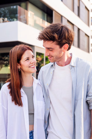 man and woman smiling happy in a romantic walk