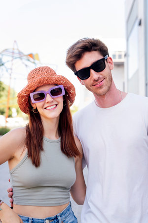 young couple smiling happy looking at cameraの写真素材