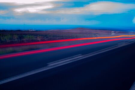 night photography and horizontal in full motion which gives an attractive blur that could be compared to the effect of alcohol or drugs, giving a feeling of anguishの写真素材