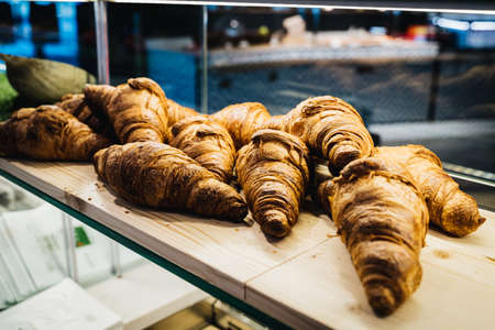 assortment of croissants in a bakery