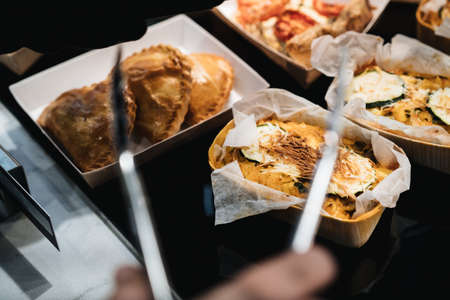 Vegan cakes exposed on a barの写真素材