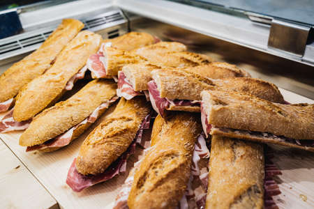 Ham sandwiches exposed in a barの写真素材