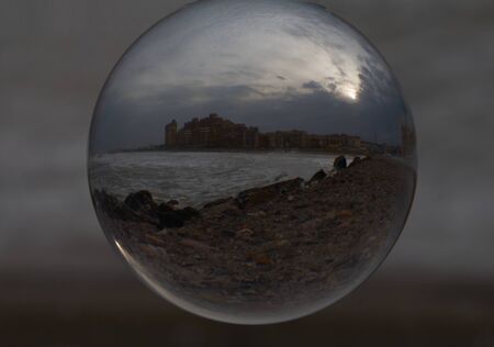 Reflections of the beach on the ball. Storm colorsの写真素材