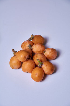Set of medlars in order on white table, natural, ecological, without retouchingの写真素材