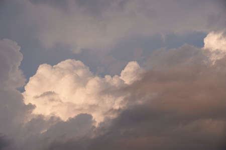 Blue sky full of white clouds, bright blue skyの写真素材