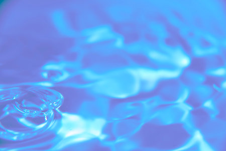 An abstract background of undefined shapes with various shades and waves, Wallpaper. Concentric circles, madness, undefined shapes, waves, blue, green, magenta, cyan, blue, green magenta cyanの写真素材