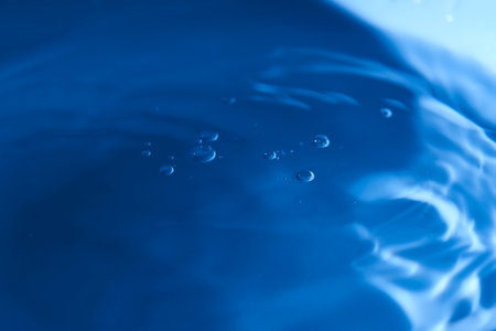 An abstract background of undefined shapes with various shades and waves, Wallpaper. Concentric circles, madness, undefined shapes, waves, blue, green, magenta, cyan, blue, green magenta cyanの写真素材