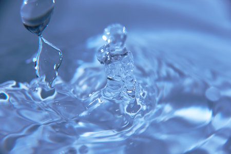152.One or more drops of water splashing into waves and undefined shapes.Wallpaper.Concentric...