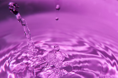 100.One or more drops of water splashing into waves and undefined shapes.Wallpaper.Concentric circles, madness, undefined shapes, waves, blue, green, magenta, cyan, metal, grayの写真素材