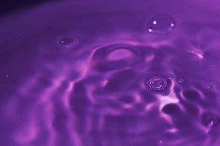 112.One or more drops of water splashing into waves and undefined shapes. Wallpaperの写真素材