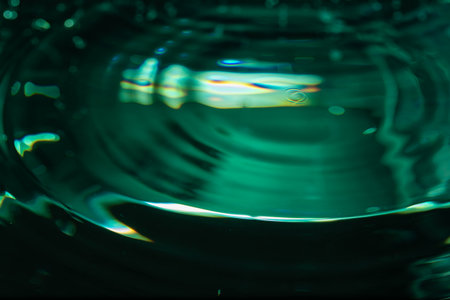 381.Water Ripples With Blue And Green Reflections On Surfaceの写真素材