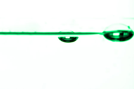 198.Green Liquid with Submerged Air Bubbles in Glass