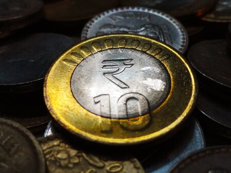 Ten and Five Rupees Indian Silver Gold Coinの写真素材