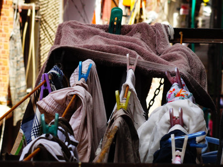 Cloths hanging on rope over balcony